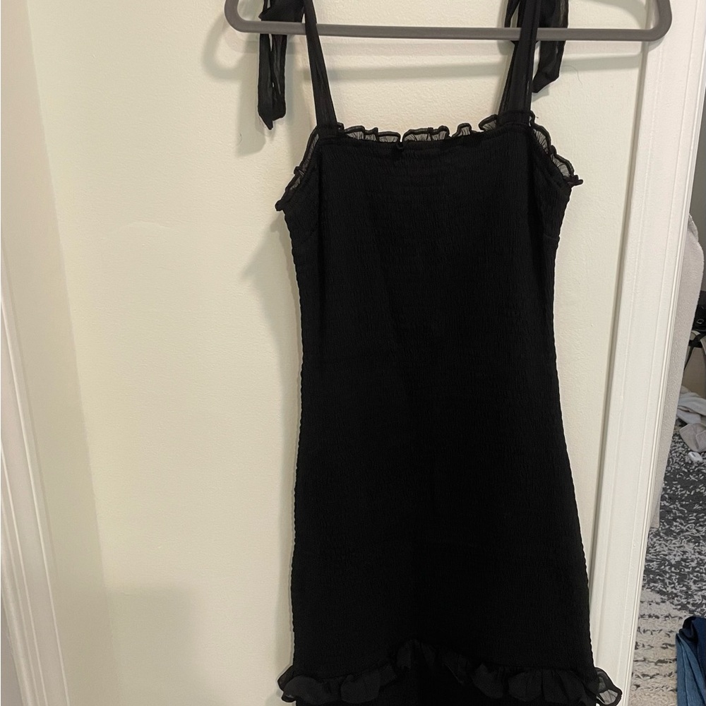 Abercrombie tiered fitted black dress with tie straps. New with tags, never worn